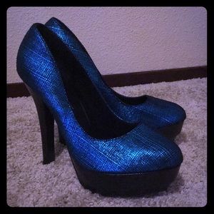 Metallic teal Justfab platform heels.